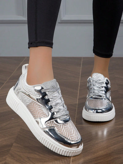 Elevate your style with our Shimmer in Style: Metallic Silver Perforated <a href="https://canaryhouze.com/collections/women-canvas-shoes" target="_blank" rel="noopener">Sneakers</a> for Women. Crafted with a sleek metallic finish and perforated detailing, these sneakers will add a touch of glamour to any outfit. Enjoy the perfect blend of fashion and comfort with these must-have sneakers.