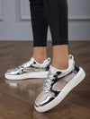 Shimmer in Style: Metallic Silver Perforated Sneakers for Women