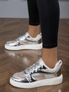 Shimmer in Style: Metallic Silver Perforated Sneakers for Women