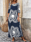 Front view of navy graphic print maxi dress with round neck and short sleeves