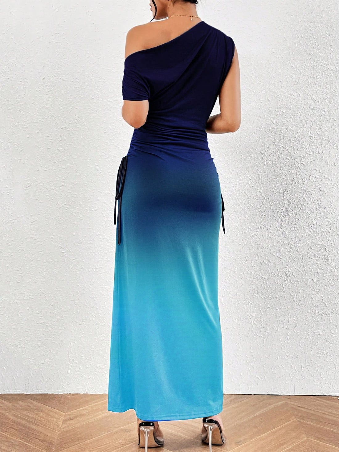 Elevate your style with our Chic Gradient Asymmetric Neckline Dress. The unique neckline adds an elegant touch, while the chic gradient design adds effortless sophistication. Perfect for any occasion, this dress will make you look and feel effortlessly elegant.