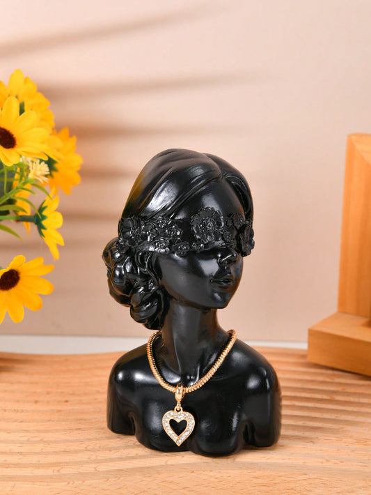 This elegant flower girl figurine is the perfect addition to your <a href="https://canaryhouze.com/collections/ornaments" target="_blank" rel="noopener">home decor</a>. With its charming design and delicate details, it will bring a touch of grace and beauty to any room. Made with high-quality materials, this figurine is a timeless piece that will add a touch of sophistication to your space.