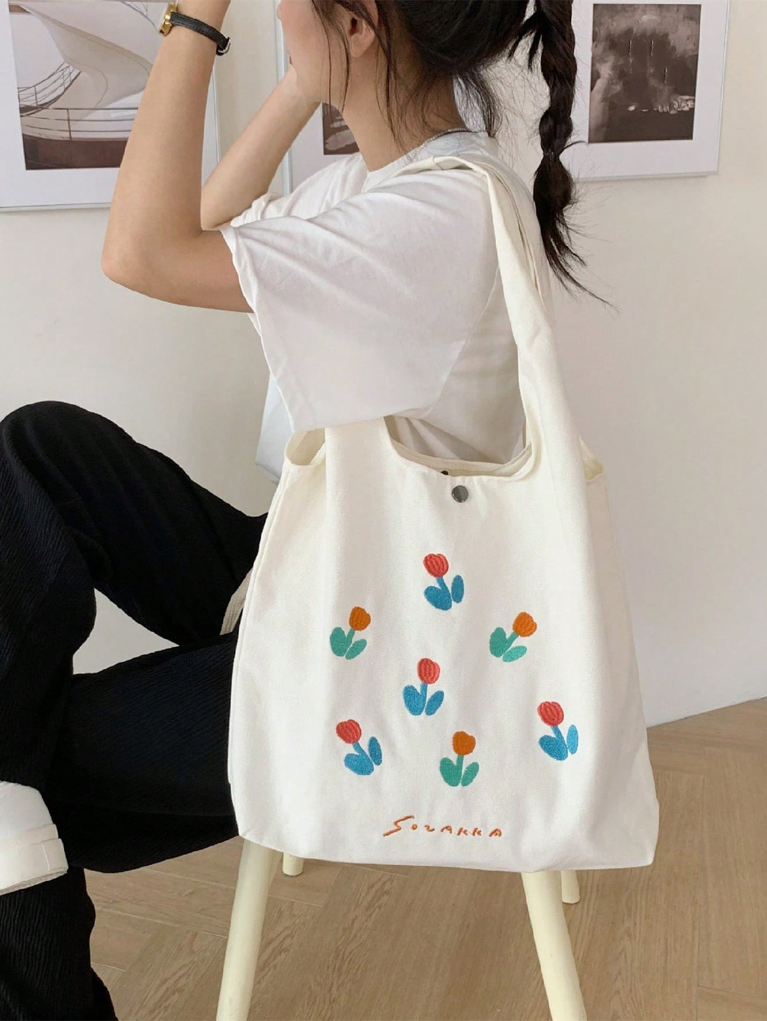 Experience luxury and sophistication with our Elegance Defined Tulip Tote Bag. Crafted from high-end materials, this versatile bag is the epitome of fashion. Add a touch of elegance to any outfit with its timeless tulip design. Elevate your style game with this must-have accessory.