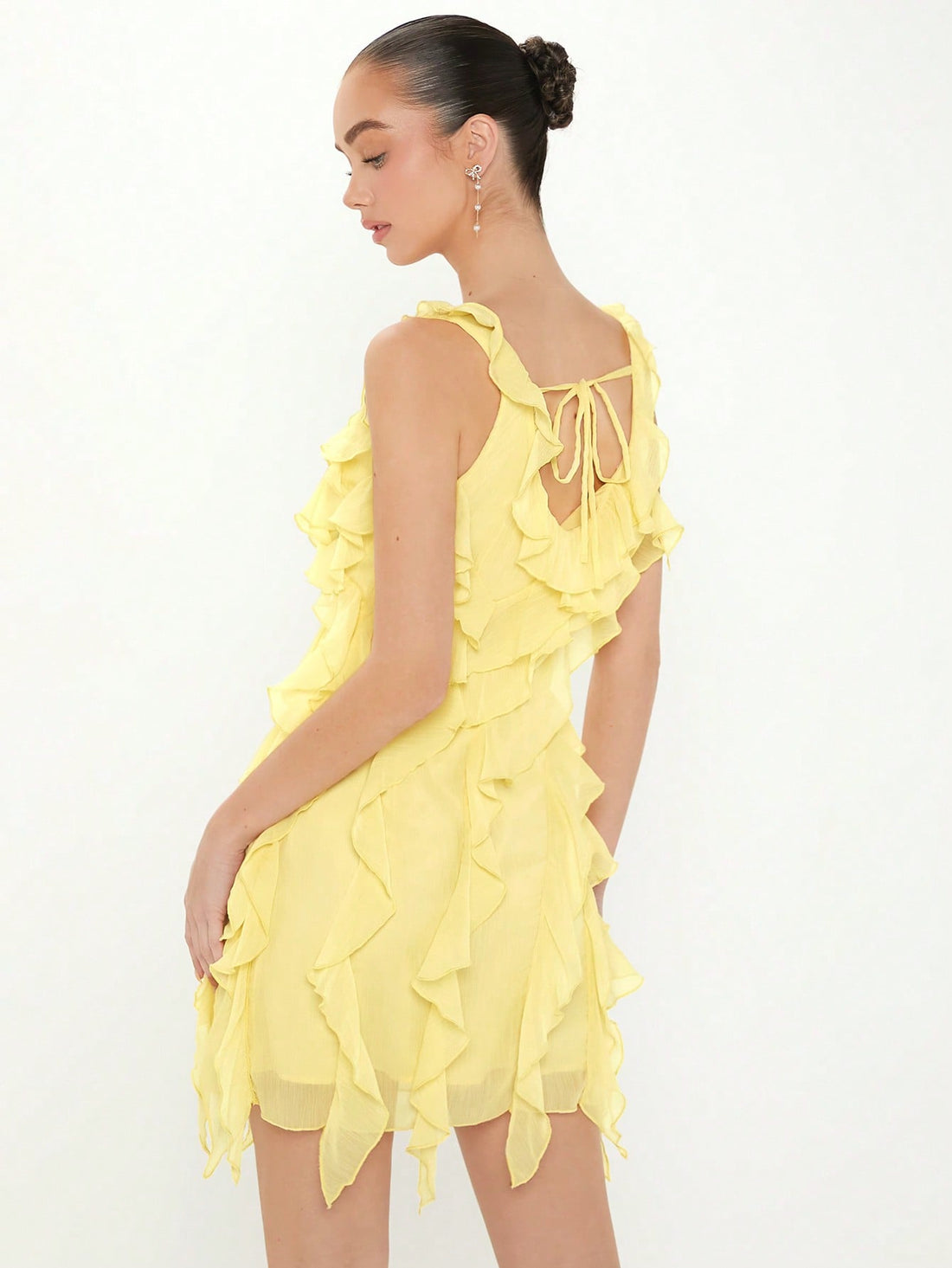 Effortlessly exude elegance in our Chic Solid Color Patchwork Ruffled Sleeveless Dress. The perfect blend of style and comfort, this dress features charming ruffles and a patchwork design. Stay effortlessly chic with this versatile and easy-to-wear dress. (No need to break a sweat to look fabulous!)