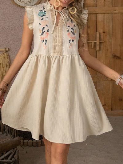 Floral Delight: Women's Embroidered Patchwork Lace Flutter Sleeve Dress