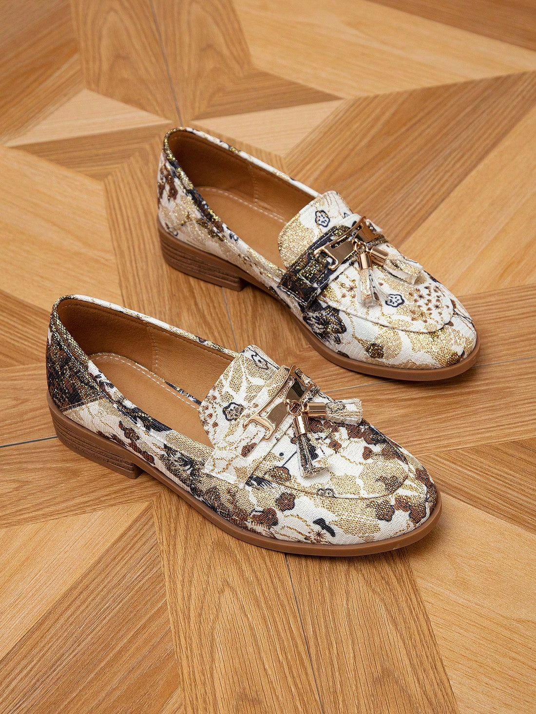 Step into the new season with these Floral Patterned Comfort Loafers. Designed for both spring and autumn, these loafers combine style and comfort for a chic look. The floral pattern adds a touch of elegance, while the comfortable fit makes them perfect for all-day wear. Upgrade your footwear game with these must-have loafers.