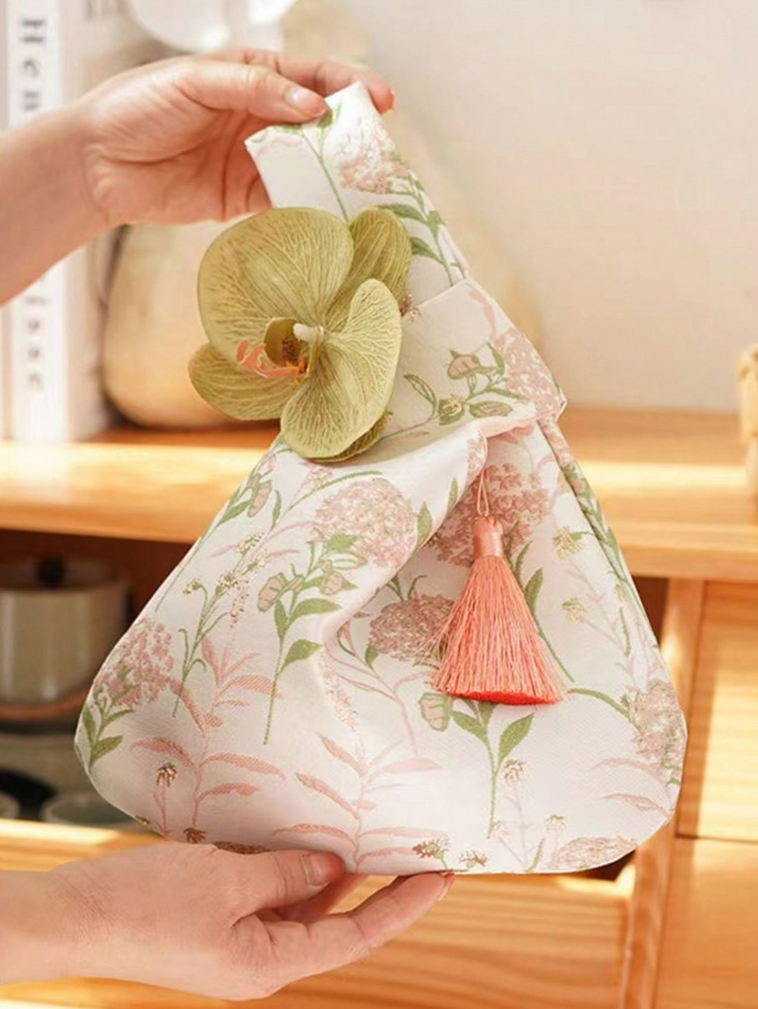 The Elegant Floral Mini Handbag is a stylish and versatile accessory that is perfect for all occasions. With its elegant floral design, this handbag will add a touch of sophistication to any outfit. Its compact size makes it ideal for carrying essentials while on-the-go. Expertly crafted for both fashion and function.