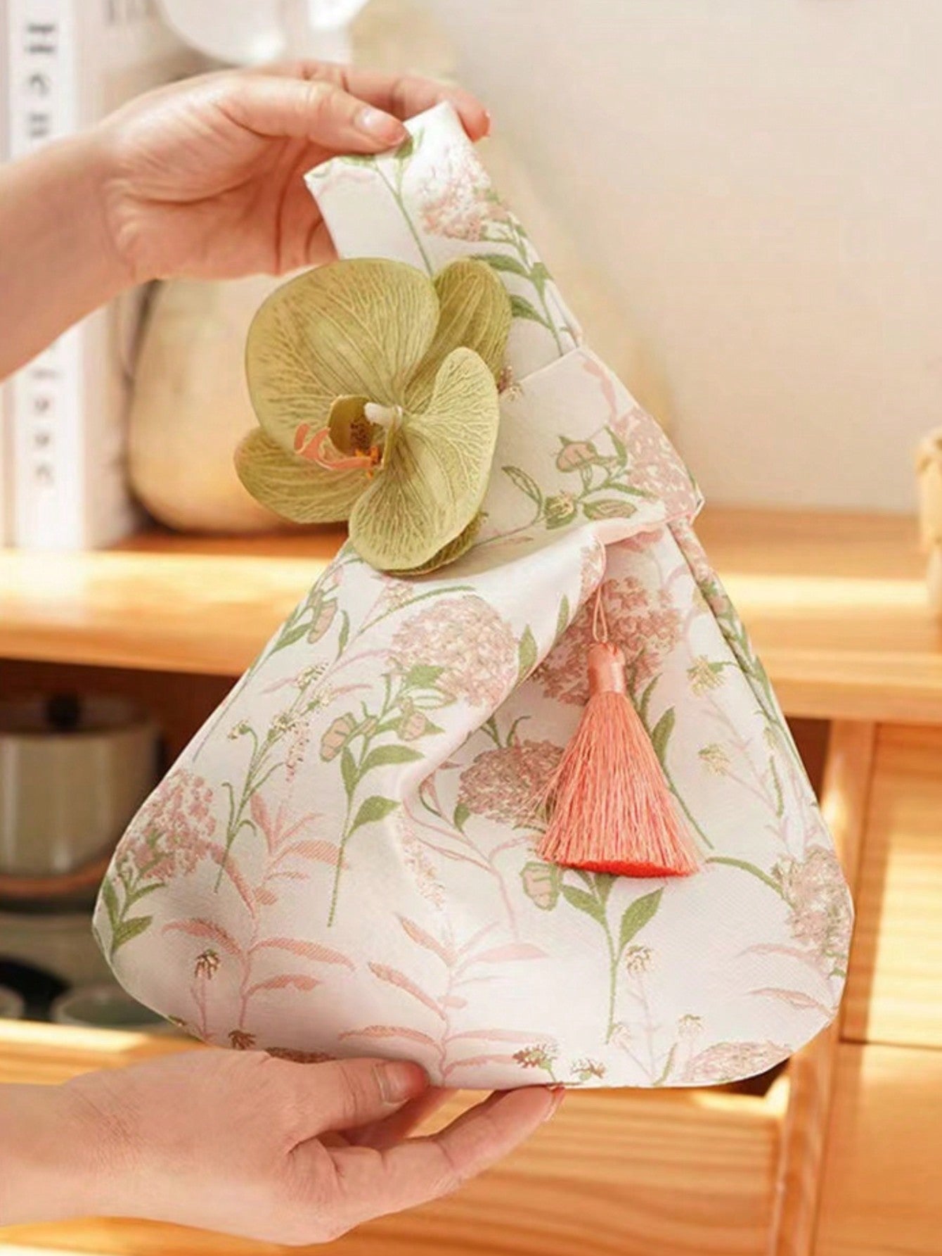 The Elegant Floral Mini Handbag is a stylish and versatile accessory that is perfect for all occasions. With its elegant floral design, this handbag will add a touch of sophistication to any outfit. Its compact size makes it ideal for carrying essentials while on-the-go. Expertly crafted for both fashion and function.