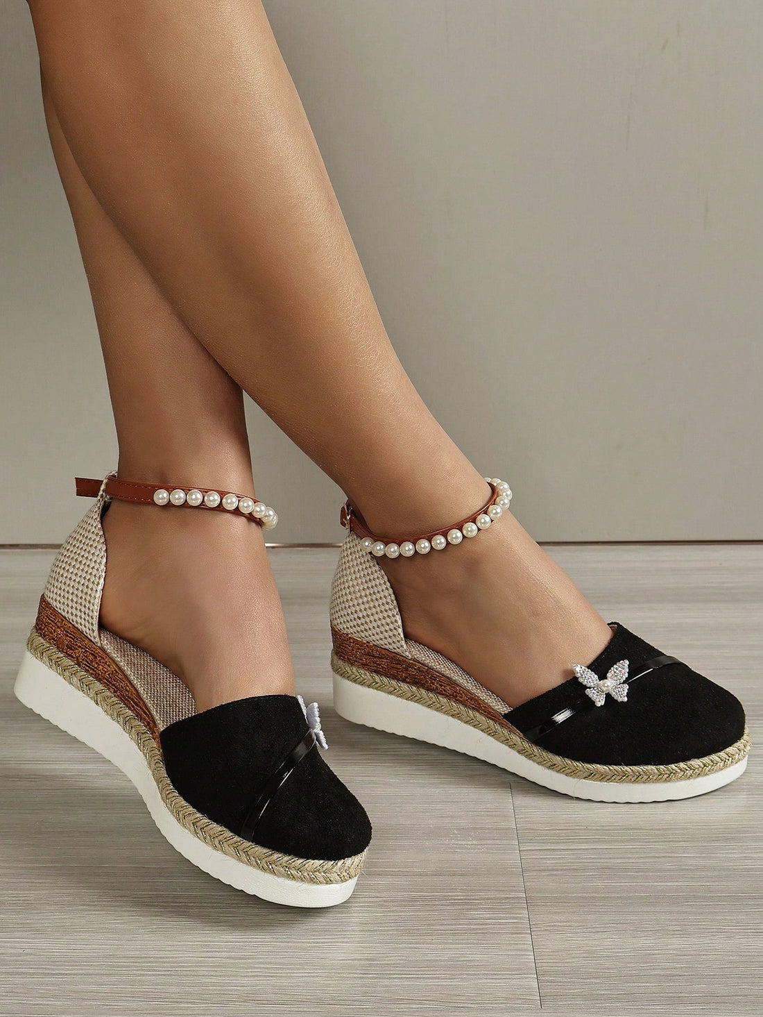 Step into style and comfort with our Elegant Butterfly Pearl Wedge Espadrilles. Designed specifically for plus size women, these espadrilles feature a beautiful butterfly pearl design and a comfortable wedge heel. Elevate your fashion game with these stylish and supportive shoes.