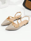 Chic Pointed-Toe Patent Leather Flat Sandals with Rivet Detailing and Buckle Strap