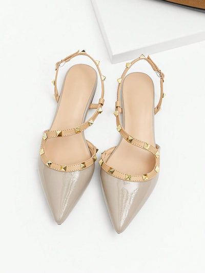 Chic Pointed-Toe Patent Leather Flat Sandals with Rivet Detailing and Buckle Strap