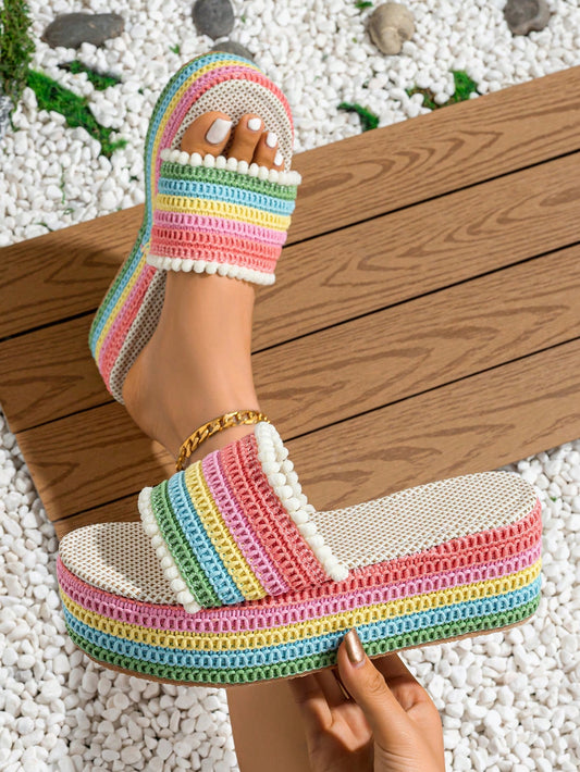 Elevate your shoe game with our Colorful Patterned Sandals. The stylish wedge sole not only adds height, but also provides comfort for all-day wear. Featuring a fun and unique fuzzy ball detail, these sandals are perfect for any summer occasion. Make a statement with these eye-catching sandals.