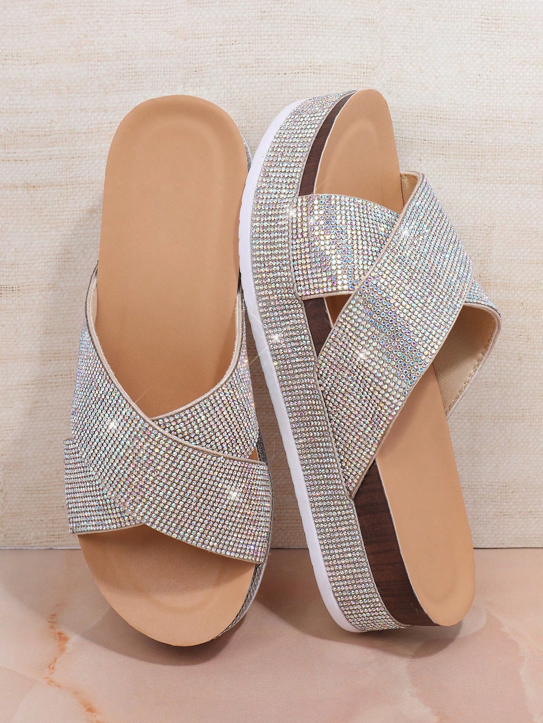 Step into summer with a splash of sparkle! These glitter platform wedge sandals aren't just shoes—they're your ticket to turning heads at every beach party and rooftop gathering. The comfortable wedge design keeps you dancing all night while the dazzling glitter finish ensures you're the star of any summer soiree. Perfect for pairing with flowy dresses or adding pizzazz to your casual jeans look!