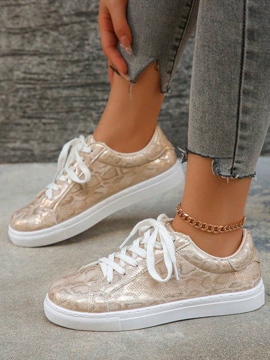 These Golden Serpent Style Casual Outdoor Flat Sneakers for women combine fashion and function with their sleek design and durable construction. With a comfortable flat sole and versatile style, these sneakers are perfect for any outdoor activity. Made with high-quality materials, they provide long-lasting support and comfort.&nbsp;