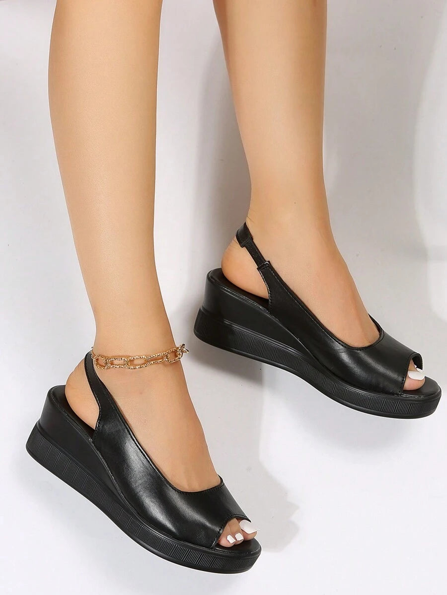 Step into summer style with these effortless platform slip-ons that go everywhere you do. Whether you're exploring new destinations or lounging by the pool, these sandals deliver comfort without sacrificing that trendy edge. The elevated platform adds a flattering lift while the slip-on design means zero fuss—just slide and go. Perfect for travel, beach days, or casual outings, they're the versatile staple that keeps up with your adventurous spirit. Lightweight, easy to pack, and undeniably chic.