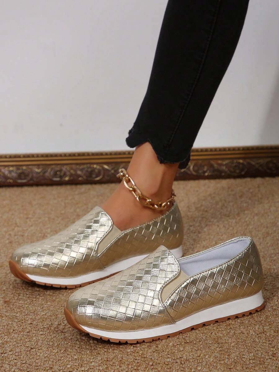 Step into effortless style with these stunning gold sneakers, your new fall and winter essential. Designed with a stretchy elastic band that hugs your foot just right, they're all about comfort without compromising on chic. Whether you're running errands or meeting friends for coffee, these casual kicks deliver that perfect blend of glam and wearability. The metallic gold finish adds instant polish to any outfit, while the supportive design keeps your feet happy all day long. Slip them on and feel the diffe