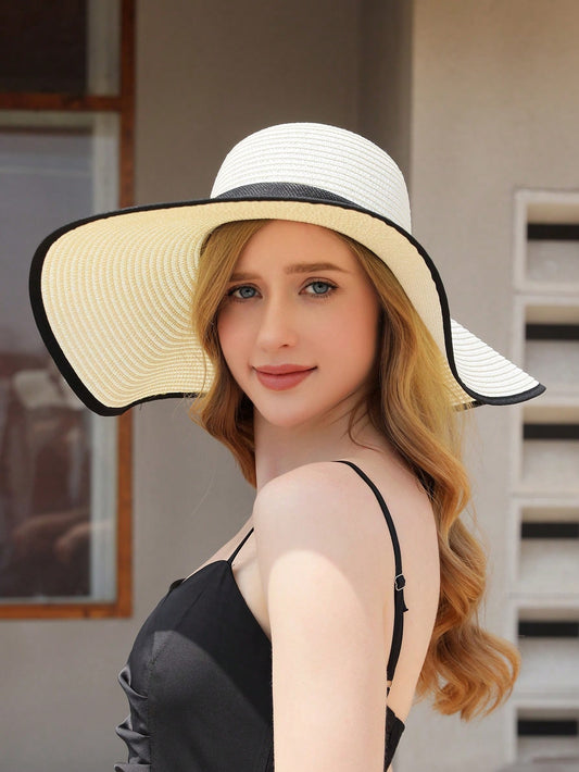 This Sun-Kissed Elegance sun hat is a must-have for any fashion-forward individual. The wide brim provides ample protection from the sun's rays, while the elegant milk white color and delicate bowknot decoration add a touch of sophistication to any outfit. Stay stylish while staying safe under the sun.