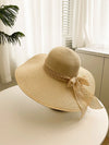 Sun-Kissed Elegance: Milk White Wide Brim Sun Hat with Bowknot Decoration