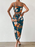 Back view of floral tie-back crop top and fitted ruched midi skirt resort outfit