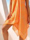 Polka Dot Paradise: Asymmetric Hem Halter Neck Dress