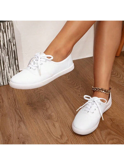 Classic White Canvas Sneakers: Unisex Couple's Casual Lace-Up Shoes