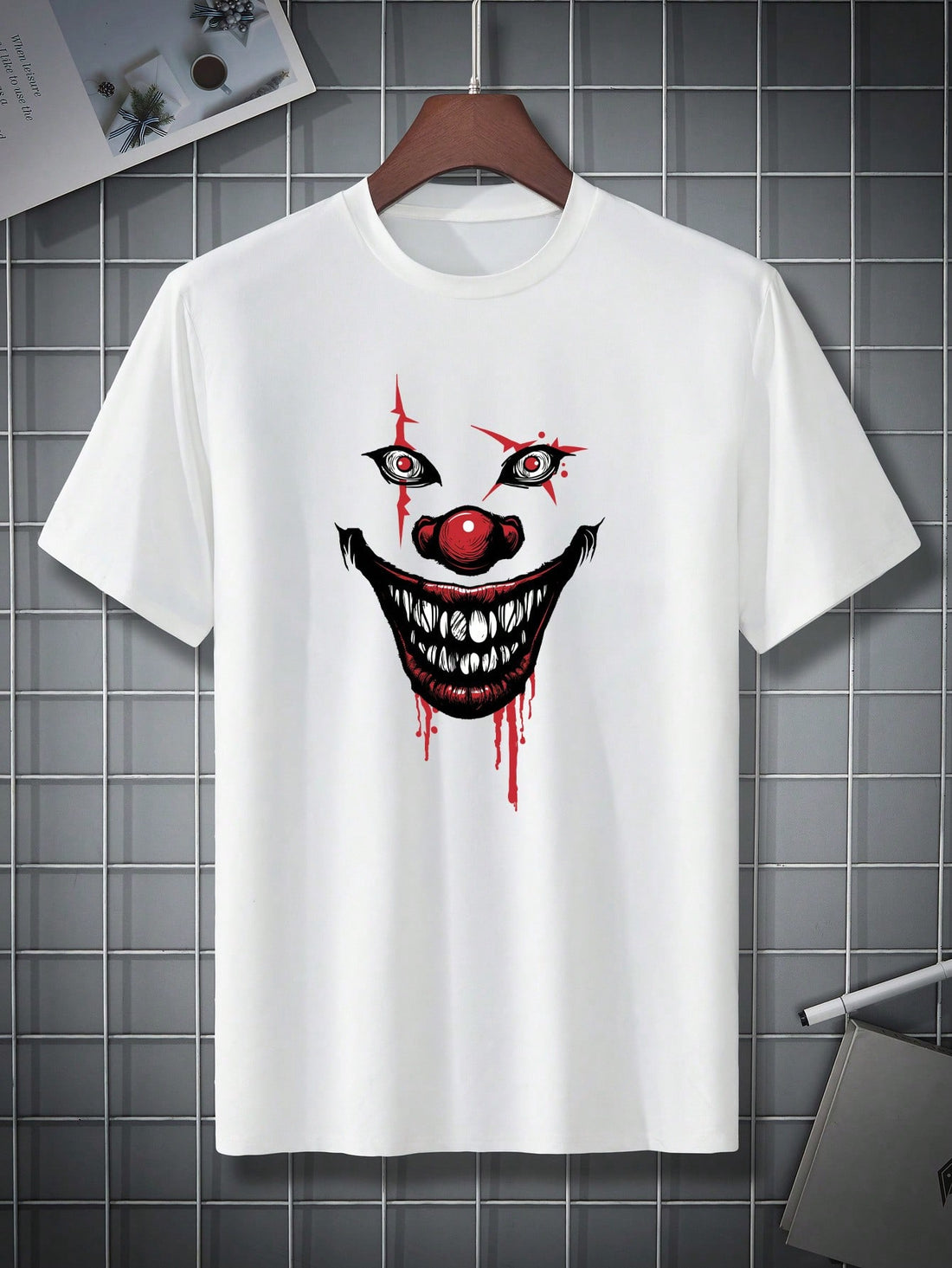This men's Halloween t-shirt features a striking Joker print and a classic round neck design. With short sleeves, it offers a comfortable and stylish option for the holiday. Made with quality materials, it's perfect for any Halloween party or event.