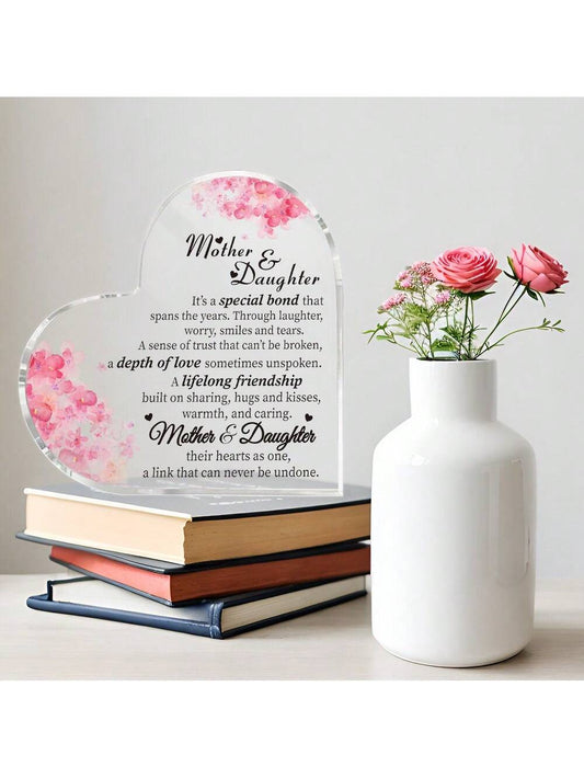 This Mother's Day, celebrate the special bond between mother and daughter with our Heart Artistic <a href="https://canaryhouze.com/collections/acrylic-plaque" target="_blank" rel="noopener">Acrylic Gift</a>. Made with high-quality materials, this gift beautifully symbolizes the love and connection shared between two individuals. Show your appreciation with a unique and heartfelt present.