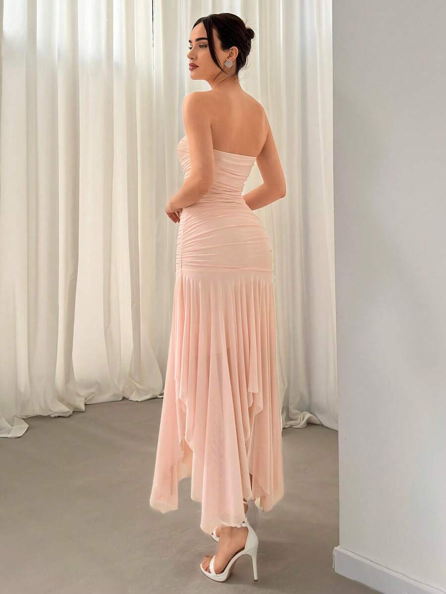 Blush pink strapless ruched mesh asymmetrical maxi dress front view