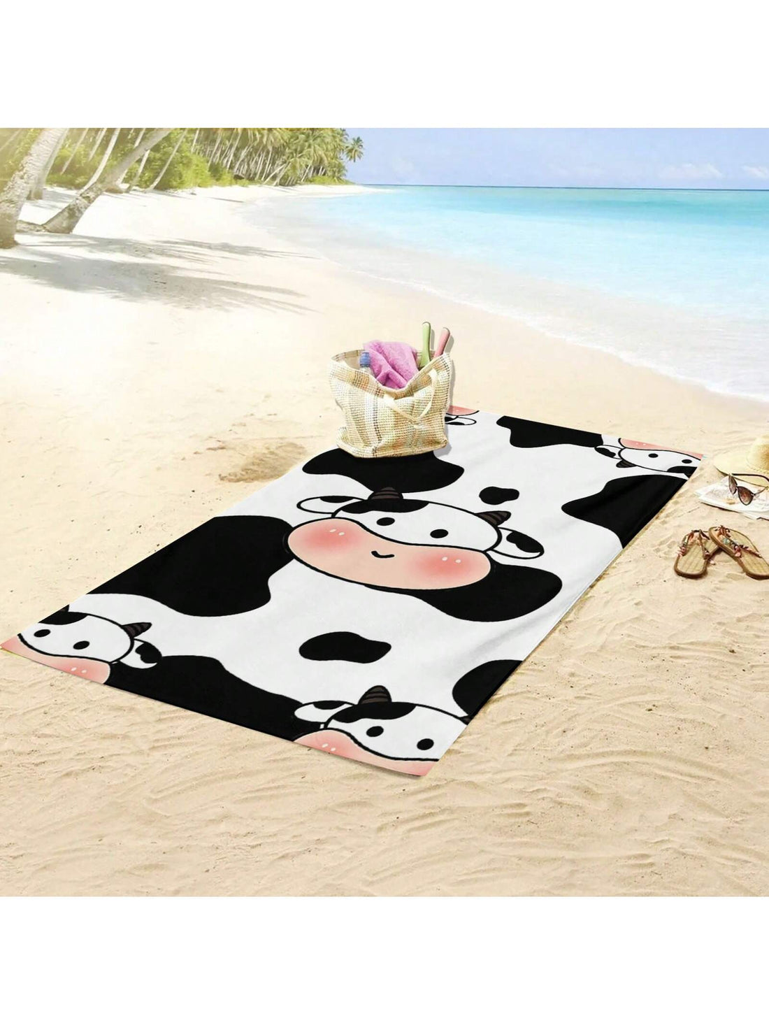 Stay stylish and sand-free this summer with our Cow Print Microfiber <a href="https://canaryhouze.com/collections/towels" target="_blank" rel="noopener">Beach Towel</a>. Made with quick-drying and highly absorbent microfiber material, it's the perfect companion for all your beach adventures. Say goodbye to pesky sand sticking to your towel and hello to ultimate comfort and convenience.