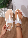 Glamorous Summer: Metallic Bow Flat Sandals for Women