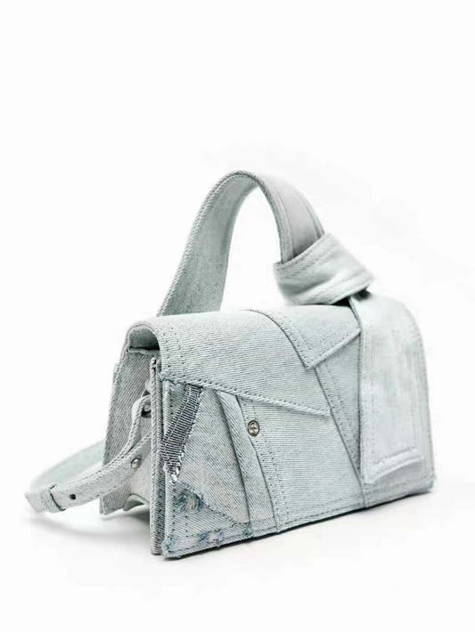 Expertly crafted, our Chic Denim Colorblock Mini <a href="https://canaryhouze.com/collections/canvas-tote-bags" target="_blank" rel="noopener">Handbag</a> is the perfect casual accessory. Designed with a colorblock pattern and made with durable denim material, it adds a touch of style to any outfit. Compact yet spacious, it's the ideal size for your everyday essentials. Elevate your wardrobe with this must-have handbag.
