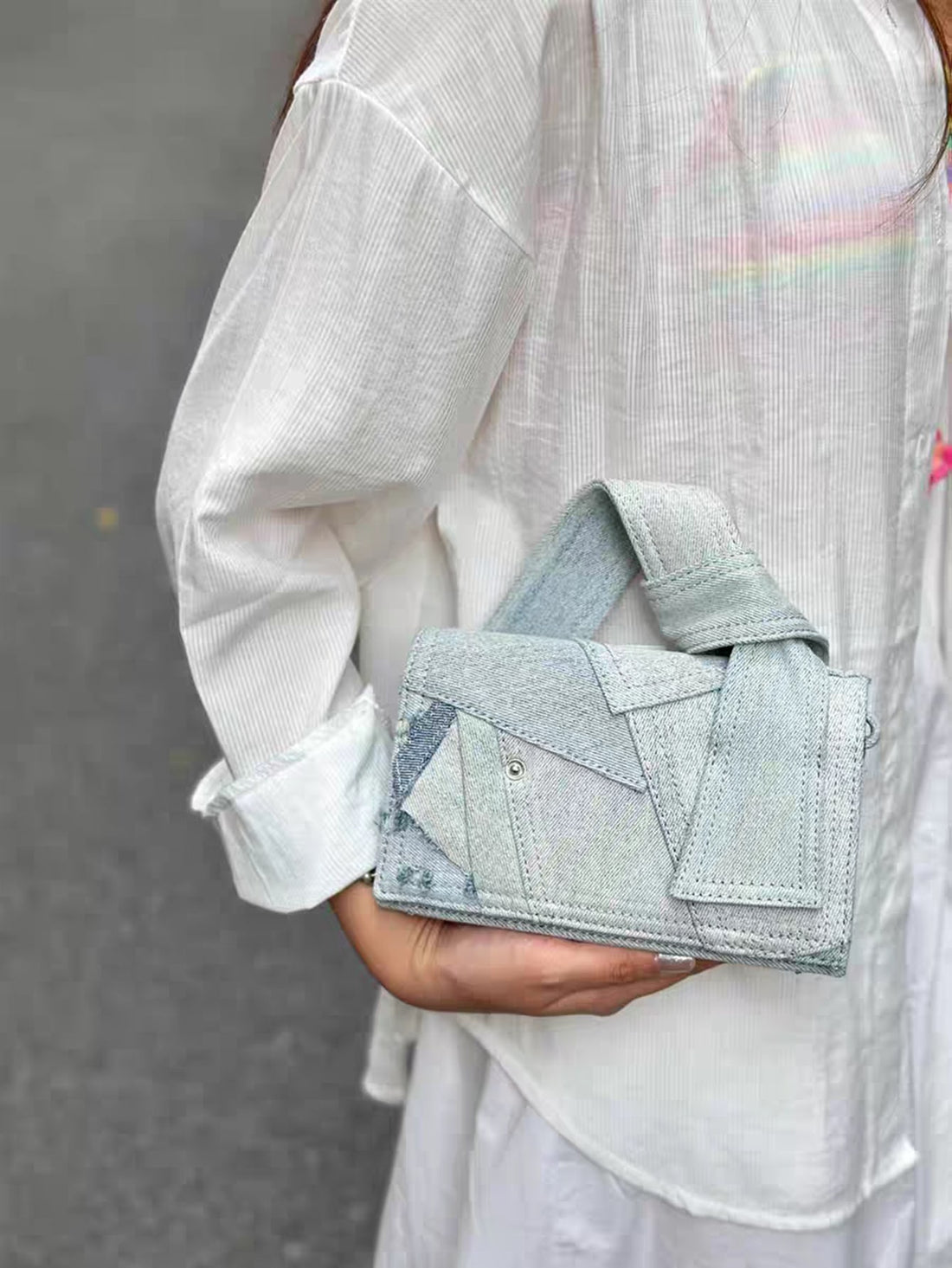 Expertly crafted, our Chic Denim Colorblock Mini <a href="https://canaryhouze.com/collections/canvas-tote-bags" target="_blank" rel="noopener">Handbag</a> is the perfect casual accessory. Designed with a colorblock pattern and made with durable denim material, it adds a touch of style to any outfit. Compact yet spacious, it's the ideal size for your everyday essentials. Elevate your wardrobe with this must-have handbag.