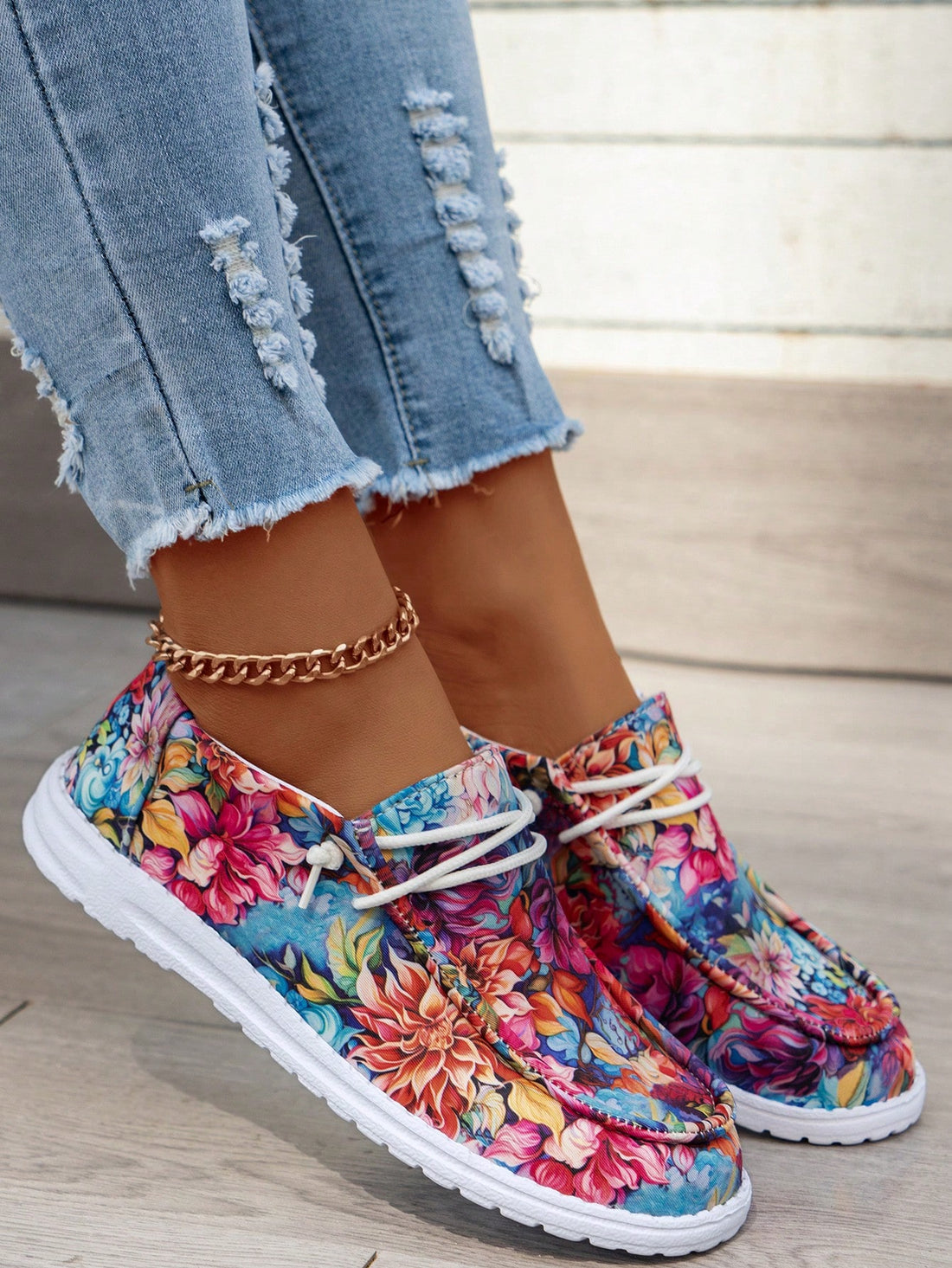 These Floral Print Canvas Sneakers offer both style and comfort, making them the perfect choice for any fashion-forward individual. Crafted with high-quality canvas, these sneakers are easy to wear and provide all-day comfort. The colorful floral print adds a touch of personality and fun to any outfit.