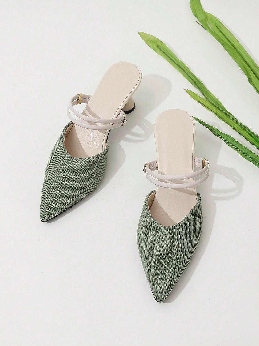 Slip into style with our Chic Pointed-Toe Two-Way Half Slippers! These versatile heels are perfect for spring and autumn, with a pointed-toe design and high heels for a chic touch. Whether you wear them as mules or with the back strap, these slippers will elevate any outfit.