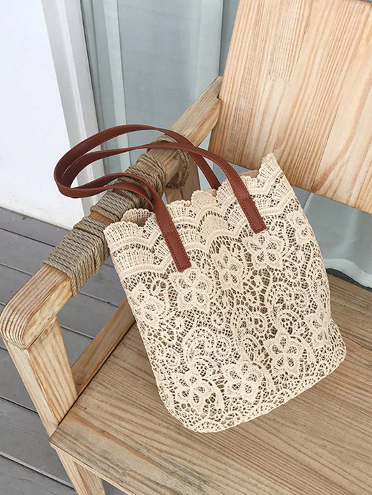 Introducing the all-new Forest Lace Beach Bag - the perfect companion for your spring and summer adventures. With its stylish design and spacious interior, this bag is both practical and fashionable. Crafted with high quality materials, it's durable and perfect for carrying all your essentials.