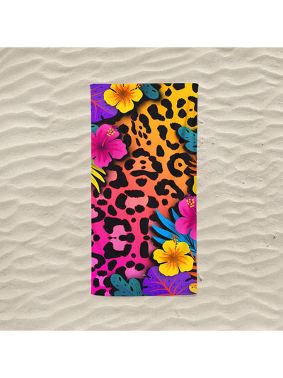 Enhance your beach experience with the Leopard Flower Paradise Microfiber Printed <a href="https://canaryhouze.com/collections/towels?sort_by=created-descending" target="_blank" rel="noopener">Beach Towel</a>. The ultra-soft microfiber material provides superior absorbency while the vibrant print adds a touch of style. Perfect for both men and women, this towel is a must-have for any seaside adventure.