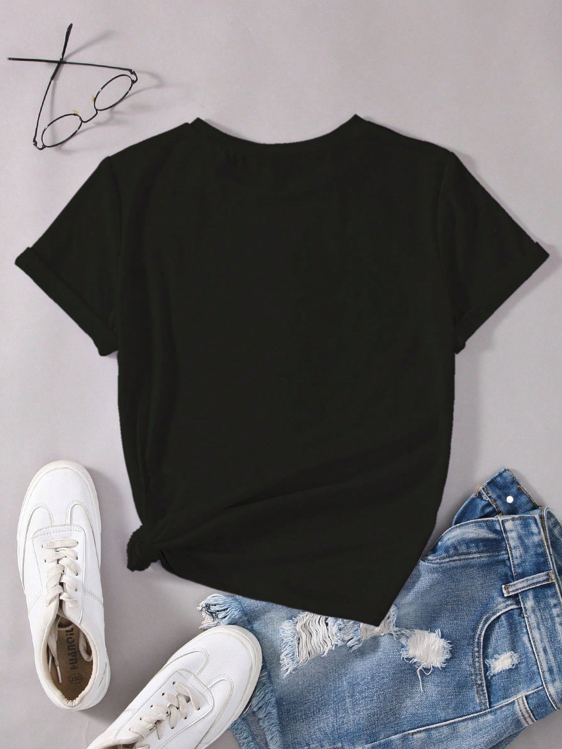 Get ready to make a statement with our Trendy Dollar Print Round Neck T-Shirt! This fun and stylish t-shirt features a bold dollar print design that will add a touch of effortless style to any outfit. Show off your playful side and make a statement without even trying with this quirky t-shirt.