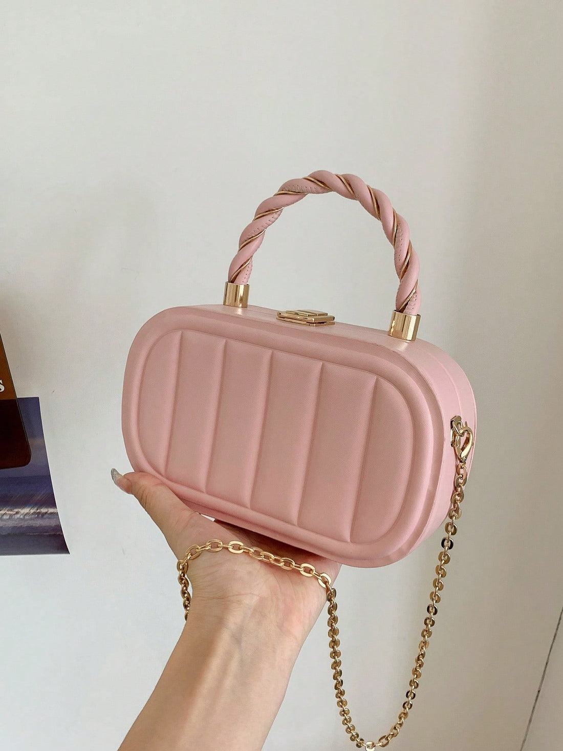 Get chic and organized with our embossed vertical stripe tote bag! Made with solid colors, this stylish bag is perfect for city life. Easily access your belongings while making a statement with its trendy design. Stay confident and fashionable with this versatile tote bag.