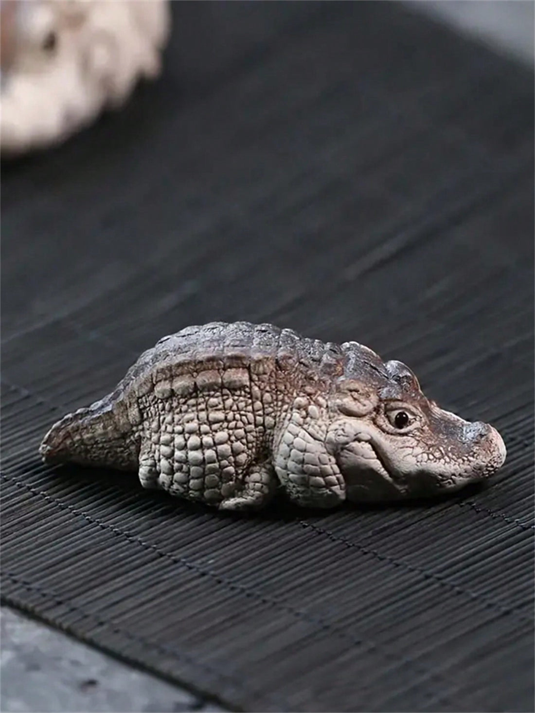 Add a touch of style to your garden with our Chic Crocodile Resin Garden <a href="https://canaryhouze.com/collections/ornaments" target="_blank" rel="noopener">Ornament</a>. Made of durable resin, this ornament mimics the beauty of real crocodiles while adding a unique and elegant touch to your home decor. Perfect for any garden, this ornament is a must-have for any discerning homeowner.
