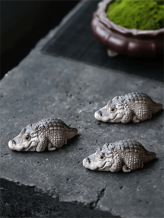 Add a touch of style to your garden with our Chic Crocodile Resin Garden <a href="https://canaryhouze.com/collections/ornaments" target="_blank" rel="noopener">Ornament</a>. Made of durable resin, this ornament mimics the beauty of real crocodiles while adding a unique and elegant touch to your home decor. Perfect for any garden, this ornament is a must-have for any discerning homeowner.