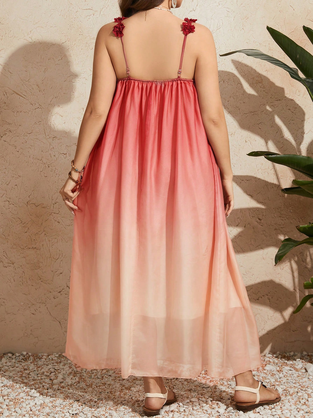 Step out in style and comfort with this Plus Size Ombre Color Spaghetti Strap Dress. Its vibrant ombre shades blend seamlessly, creating a fun and flirty look that's perfect for any occasion. The lightweight spaghetti straps keep you cool and carefree, while the flattering fit embraces your curves with ease. Whether you’re headed to brunch or a breezy evening stroll, this dress adds a playful splash of color to your wardrobe.