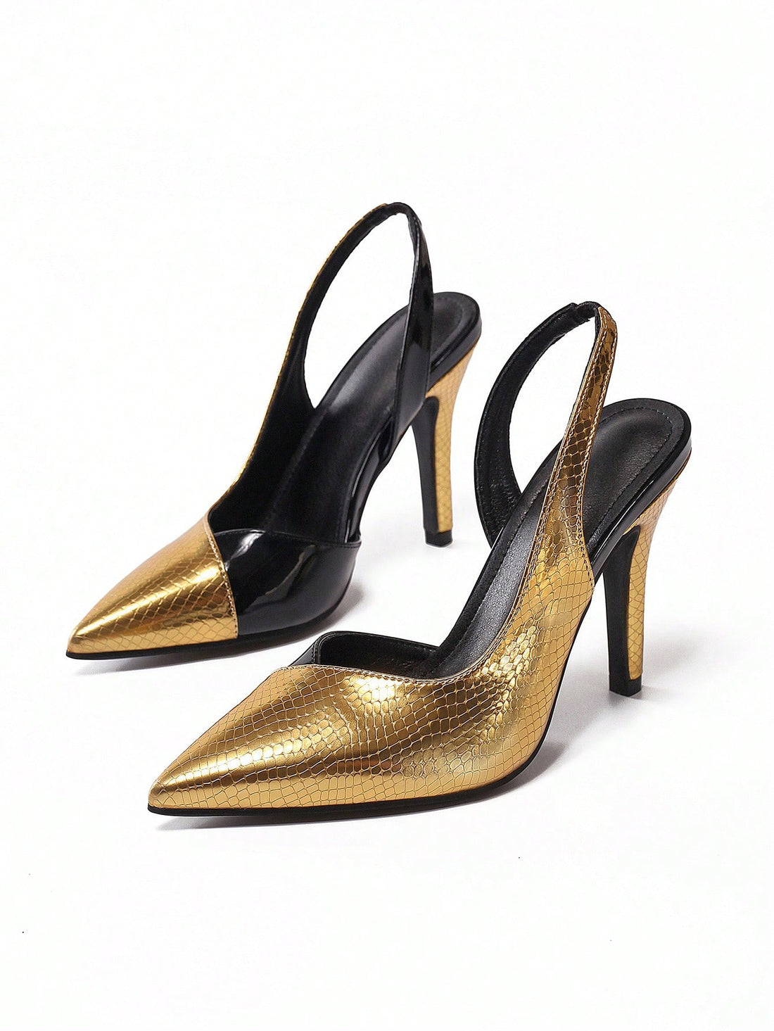 Elevate your style with Golden Glamour: Elegant Stiletto <a href="https://canaryhouze.com/collections/women-canvas-shoes" target="_blank" rel="noopener">Sandals</a>. These color block heels are perfect for parties and formal occasions, providing both fashion and functionality. The sleek design and striking colors make a statement, while the stiletto heel adds height and elegance. Step out in style and confidence with Golden Glamour.