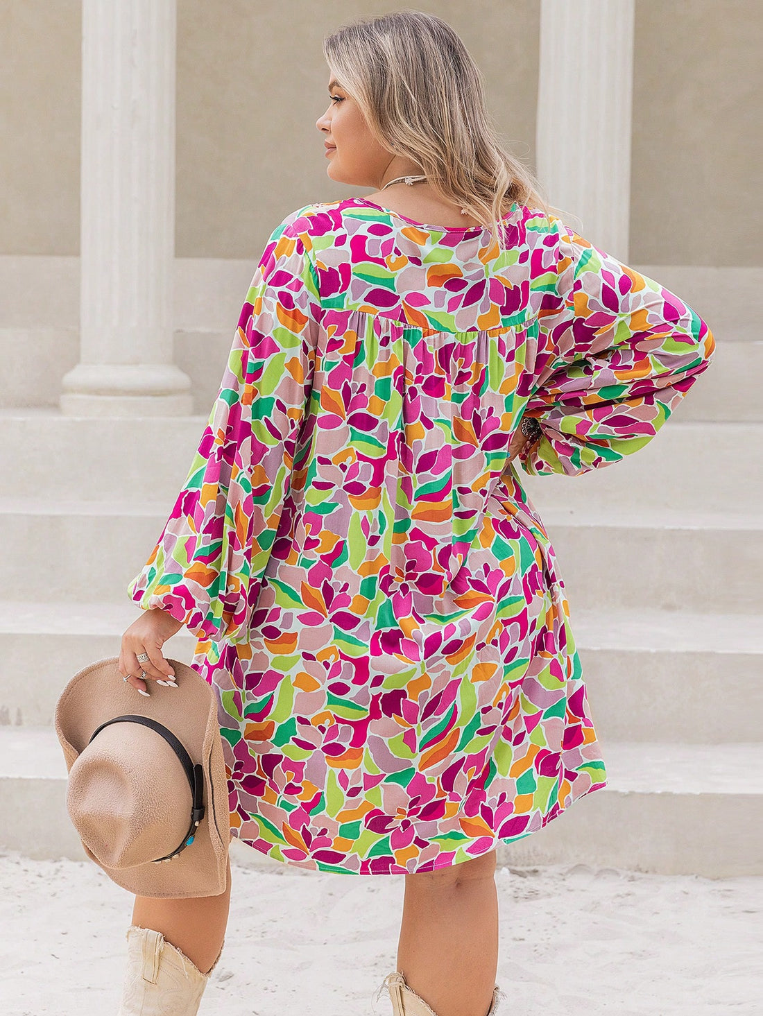 Elevate your style with our Plus Size Geometric Printed Dress. Designed to embrace your curves, the lantern sleeves add a trendy touch while the geometric print offers a modern flair. Perfect for any occasion, this dress allows you to confidently show off your unique shape.