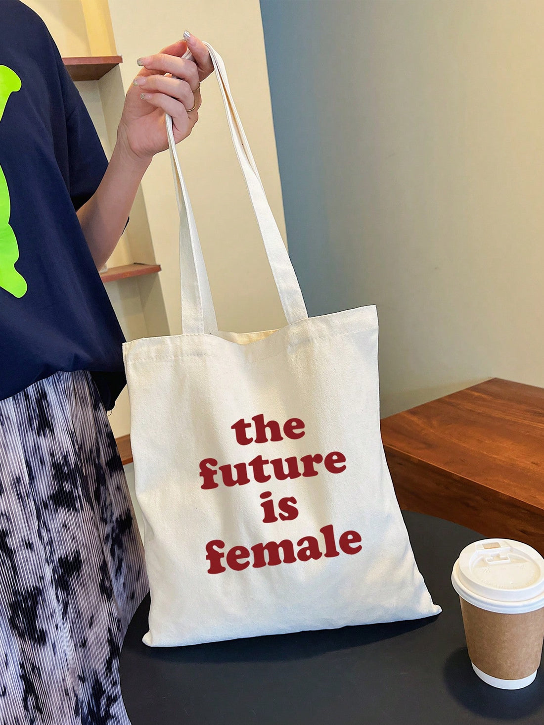 Upgrade your style game with our Redefine Your Style: The Future Letters Canvas Tote Bag for Women. This trendy and durable tote bag is perfect for any occasion. Its spacious design and sturdy canvas material make it both fashionable and practical. Make a statement with this must-have accessory.
