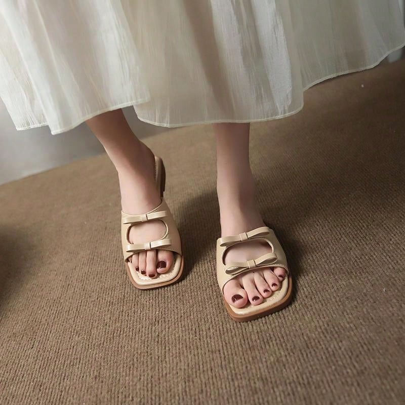 These French-style summer sandals exude chic elegance with their vintage low-heel design and charming bow knot accent. Perfect for any summer occasion, these sandals not only add a touch of charm to your outfit but also provide a comfortable and stylish option for your feet. Elevate your summer style with these charming sandals.