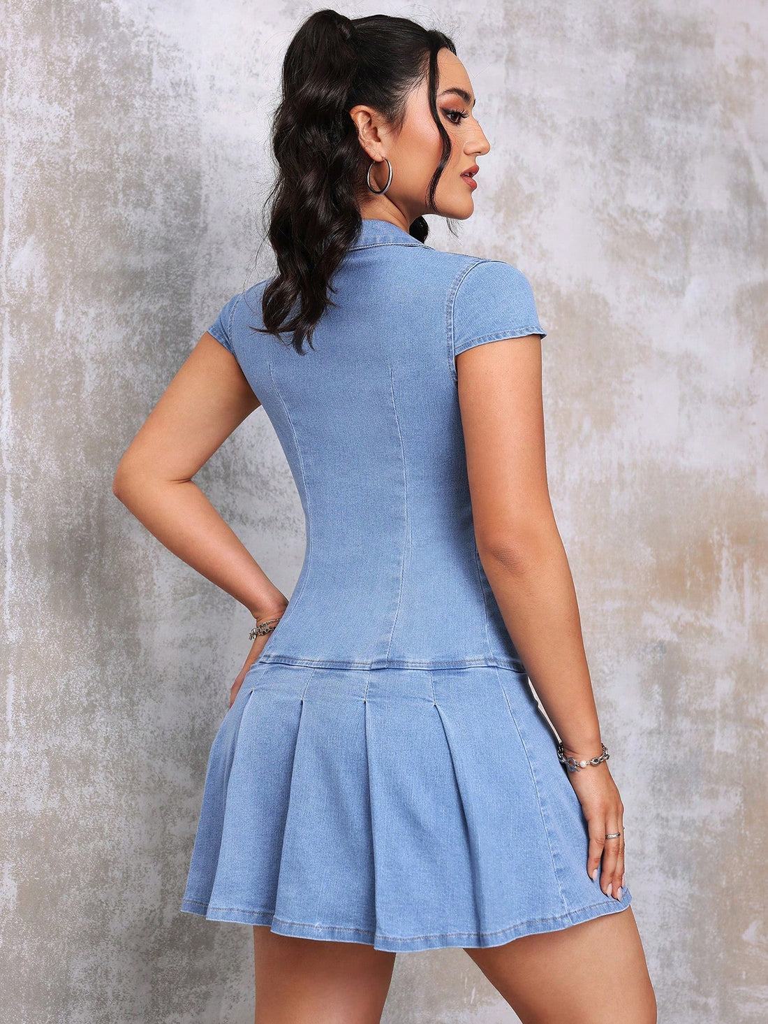 Unleash your effortless chic with our Casual & Sexy V-Neck Pleated Denim Mini Dress! Embrace comfort and style with our pleated design, perfect for a casual yet flirty look. Pair with your favorite heels and accessories for a touch of sexiness. Your ultimate go-to for any occasion.