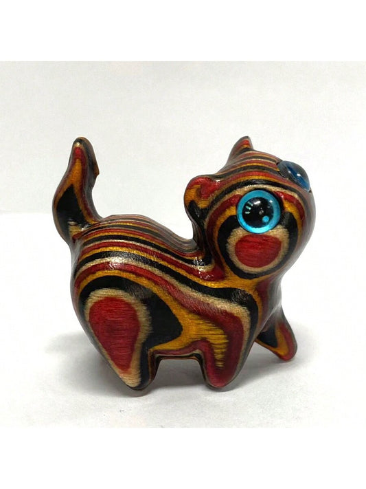 This handcrafted wooden cat toy is <a href="https://canaryhouze.com/collections/ornaments?sort_by=created-descending" target="_blank" rel="noopener">a perfect birthday surprise</a> for pet lovers. The colorful design makes it a unique and playful addition to any pet's toy collection. Made with love and attention to detail, this toy serves as a beautiful pet memorial to honor the memory of a beloved feline friend.
