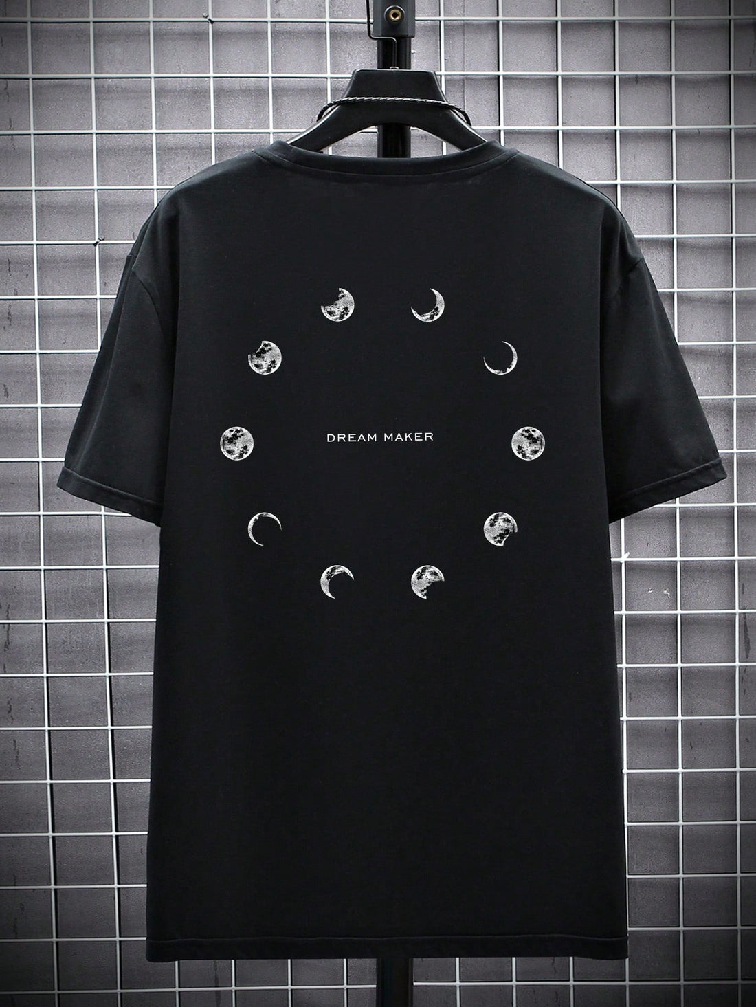 Get in touch with the cosmos in our Cosmic Vibes tee. Featuring a drop shoulder design and a unique moon print, this tee is perfect for those who want to add some quirky fun to their wardrobe. Embrace your lunar side and make a statement with Cosmic Vibes!