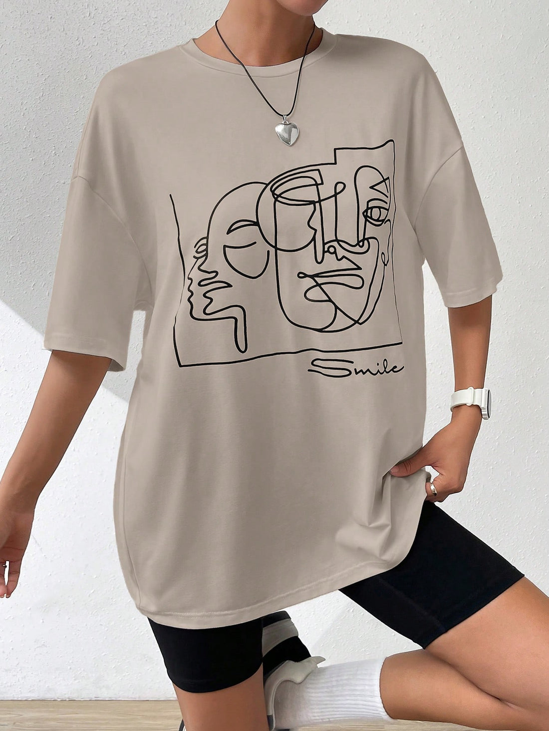 Introducing the Chic Y2K Abstract Figure Graphic Drop Shoulder Tee, the perfect addition to your summer wardrobe. With a stylish and effortless design, this tee features an abstract figure graphic that adds a touch of sophistication to any outfit. Its drop shoulder design provides a comfortable and relaxed fit, making it the ideal choice for all-day wear. Elevate your summer style with this chic and trendy tee.