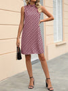 Elegant Sleeveless Mandarin Collar Dress with Full Print Details